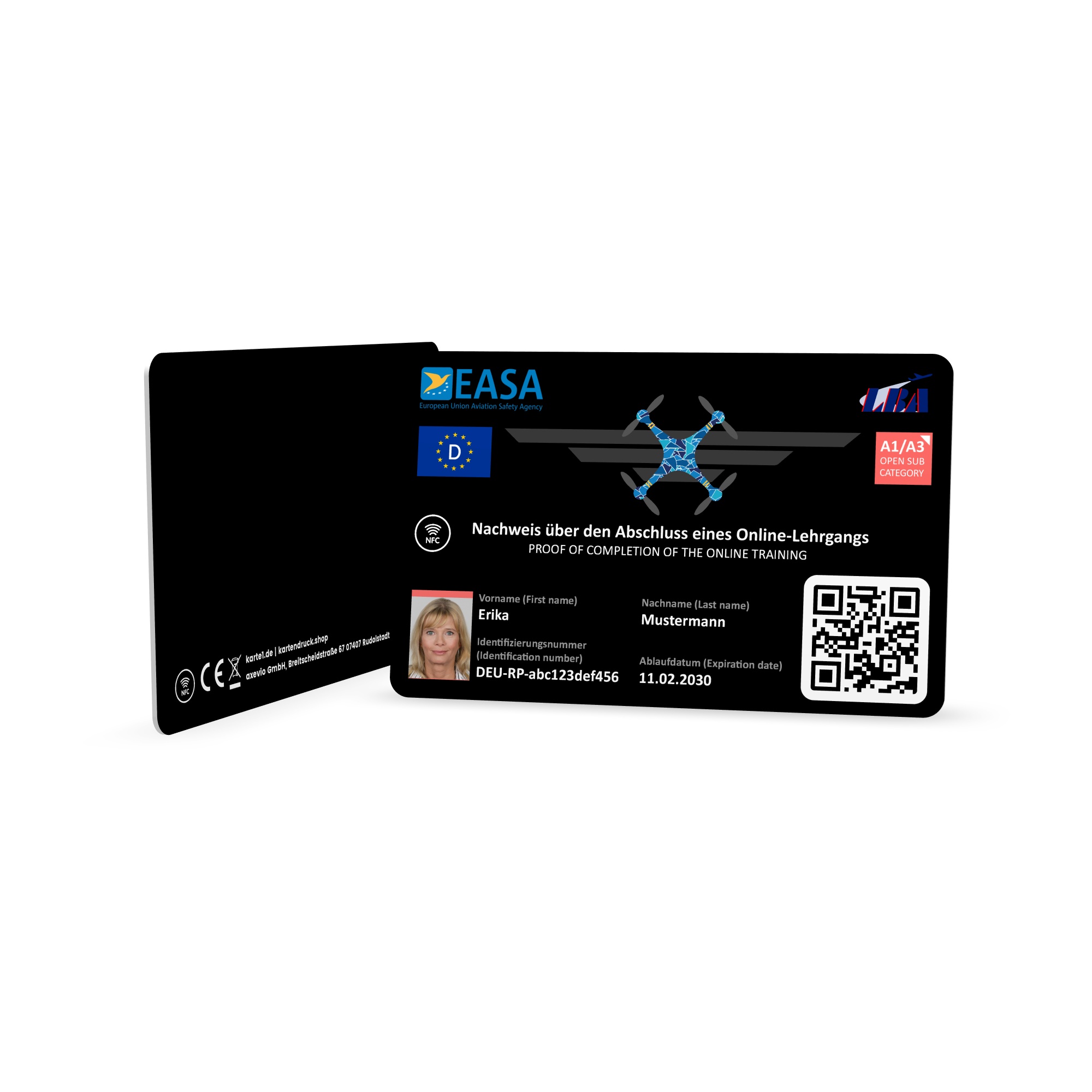 Black smart NFC EU drone license plastic card with photo in credit card format, angled on a white background. Displays the printed front side with holder details and QR code alongside the black back showing mandatory CE, wheelie bin, and NFC symbols with…
