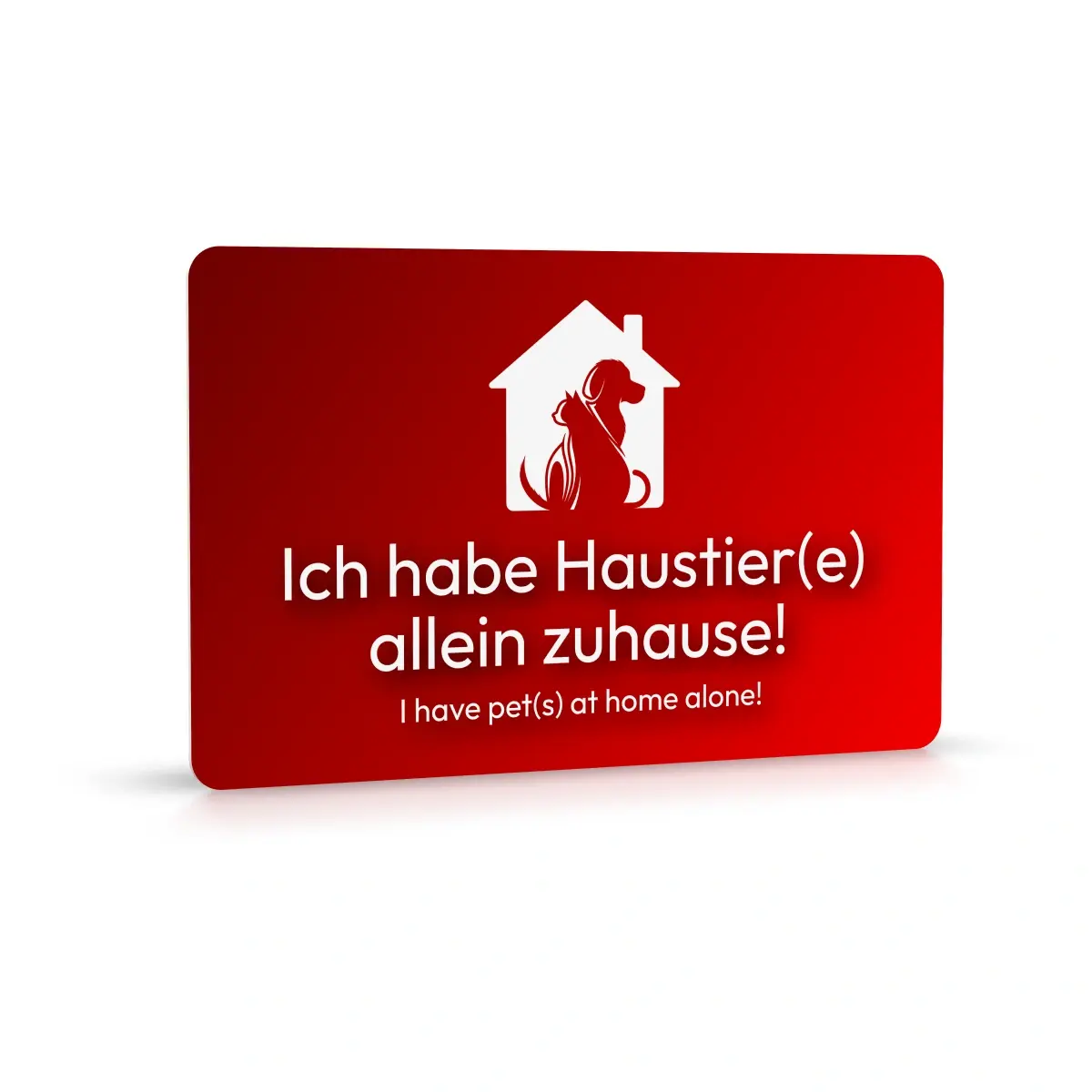 Rote Notfallkarte im Querformat auf weissem Hintergrund. Sie zeigt ein weisses Haussymbol mit Hund und Katze sowie den zweisprachigen Text «Ich habe Haustier(e) allein zuhause!» und «I have pet(s) at home alone!».